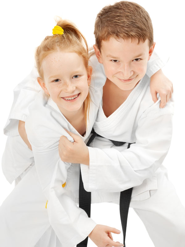 Boy and Girl smiling while grappling